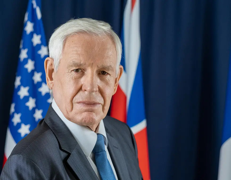 Senior Veteran With US Flag On The Background